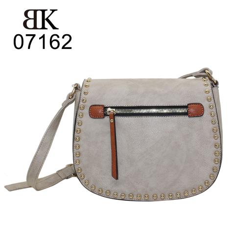 Grey cross body bags with more studs all around flap