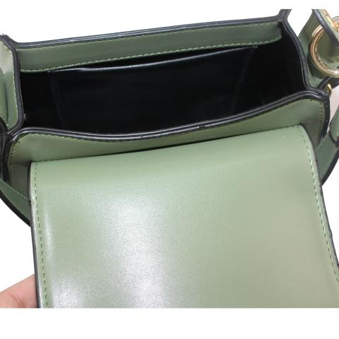 The glossy metallic hardware provides an opulent finish, adjustable shoulder strap. Featuring flap with magnetic snap closure and gold ring, pocket under flap.