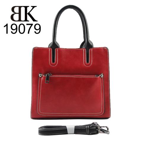 The timeless red tote bag match all of your wardrobe, double handles and detachable adjustable shoulder strap, it also come with an exterior zipper pocket to carry your make-up or little things.