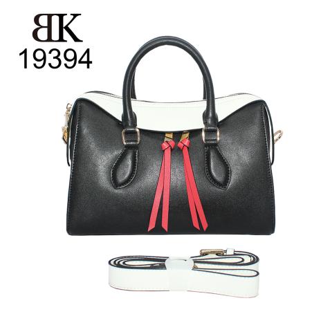 The fashion handbag’s color goes with black, white and red, with ample room to carry all of your necessities, gold tone hardware, top zip to keep things secure.