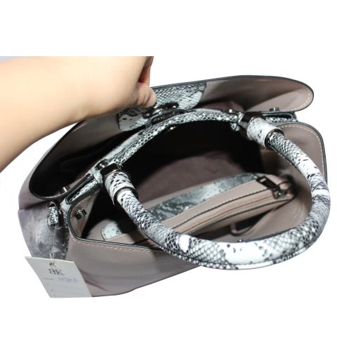 he simple fashion handbag comes with single handle, gun hardware, lock closure on front and adjustable cross body trap. Suitable as on everday office tote or weekend carryall.